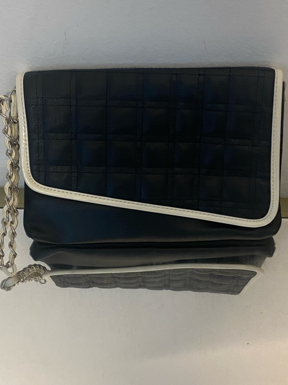 Bebe Black Quilted clutch Bag with White Trim
